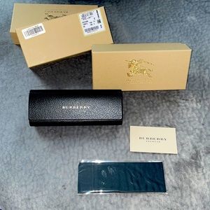 Authentic Burberry black leather glasses case.